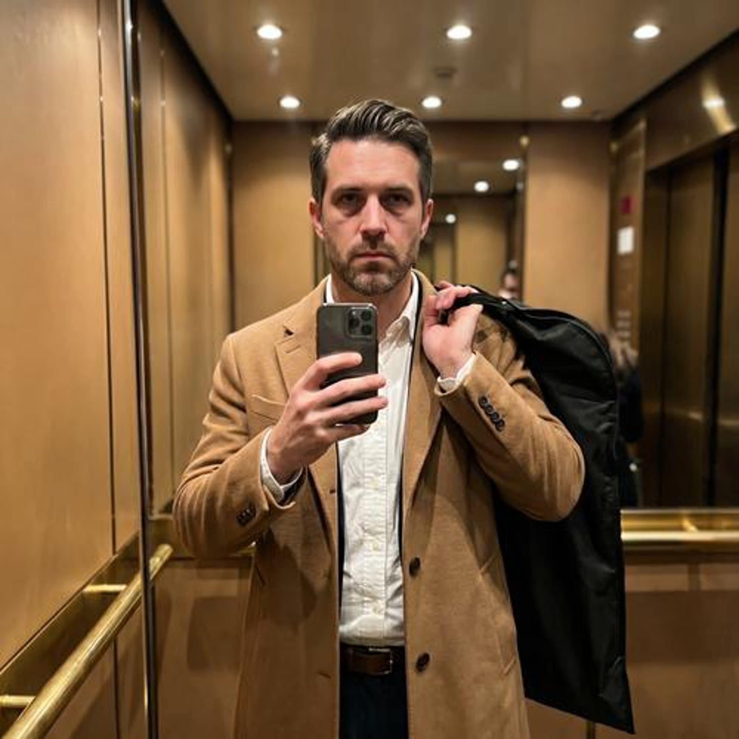 Quiet Luxury · hotel-elevator origin selfie